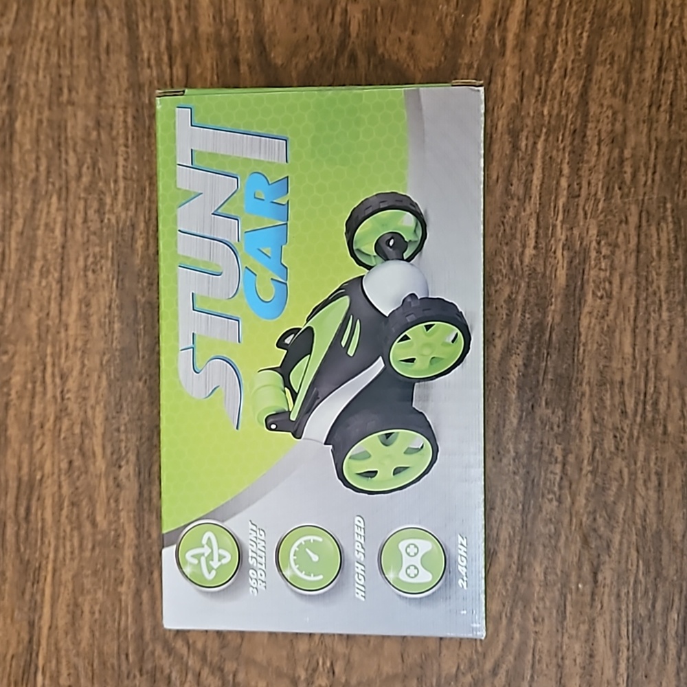 Growsly NIB  green rolling remote control stunt car for ages 3 and up